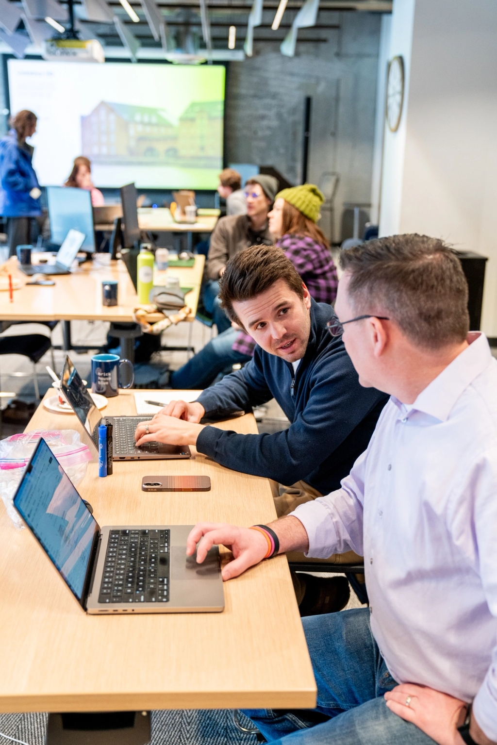 Developers collaborating at MoreSteam's Annual Hackathon 2026